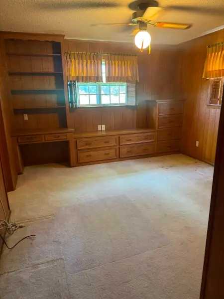 Empty, swept-out bedroom after a whole-home cleanout