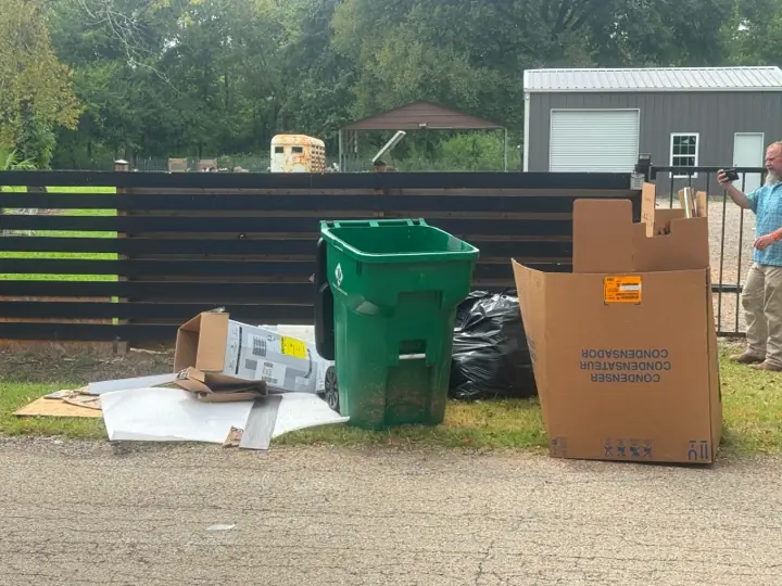 Boxes and cardboard staged curbside for haul-away